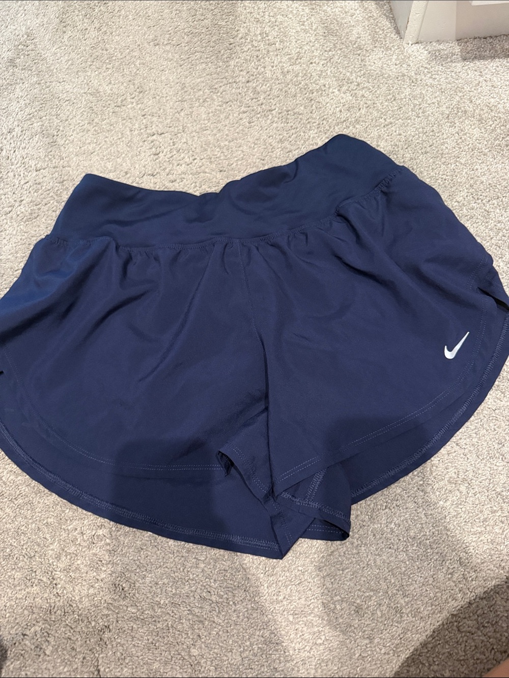 Nike Women's Navy Athletic Shorts with silver Swoosh